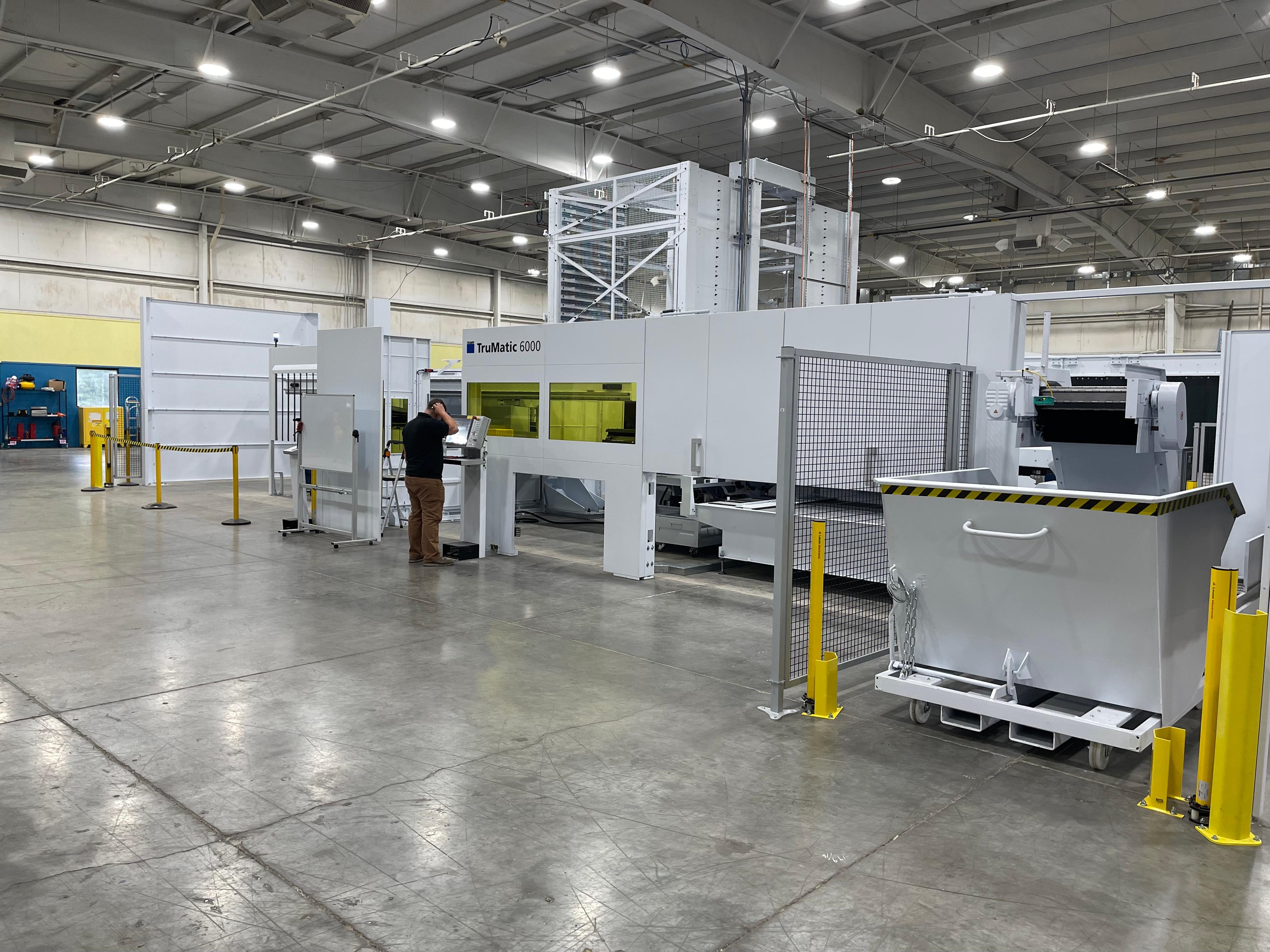 Metal fabrication machine cell inside a factory