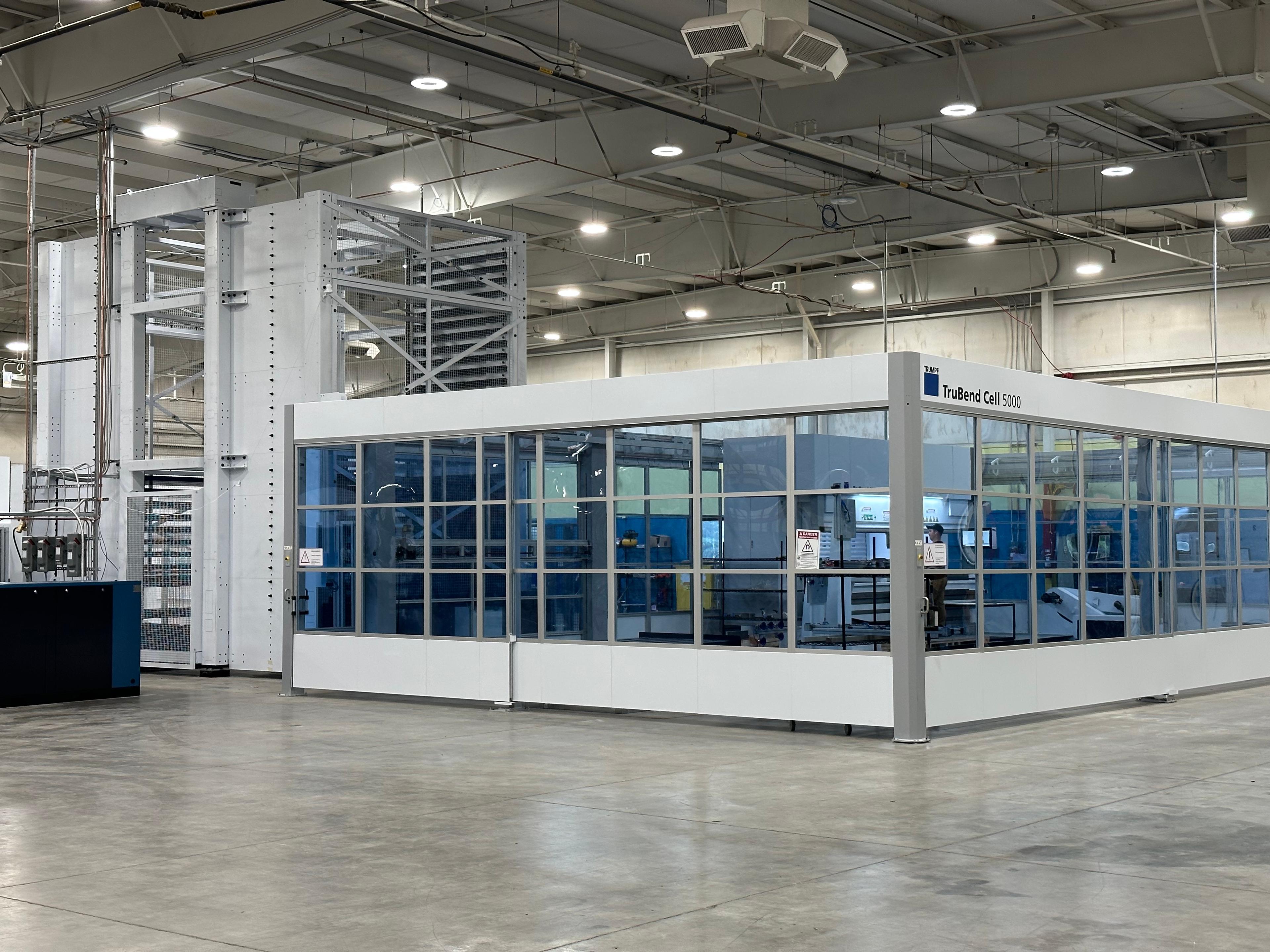 Metal fabrication machine cell inside a factory